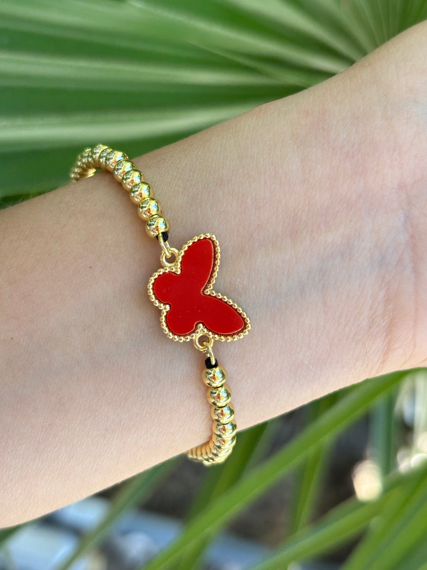 #9-B butterfly red hilo bracelet adjustable