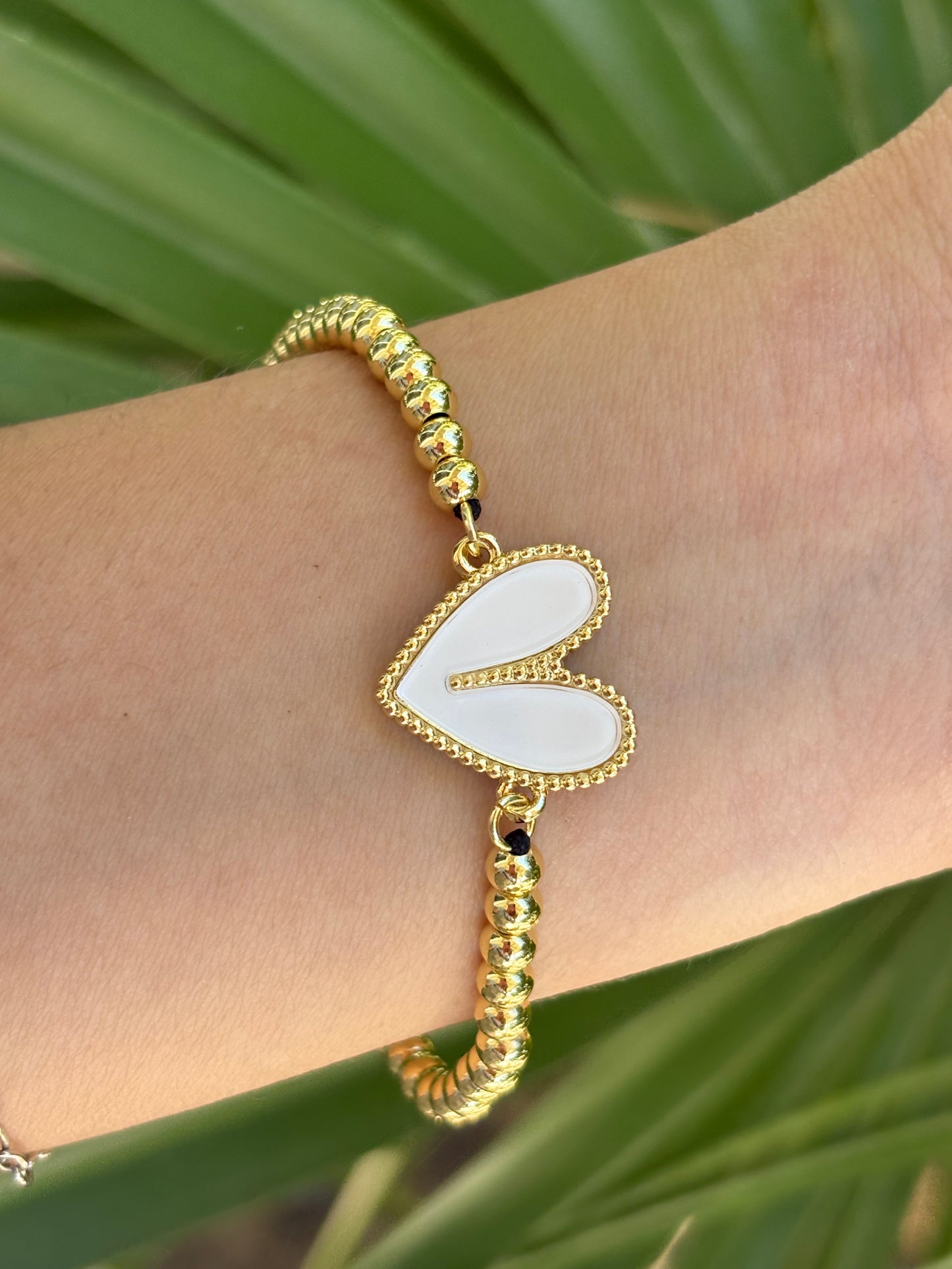 #7-B heart hilo bracelet adjustable
