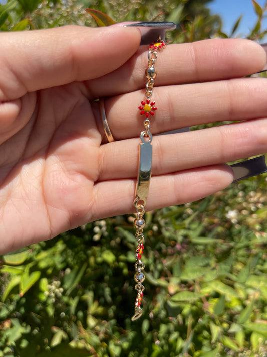 Flor placa pulsera de niños