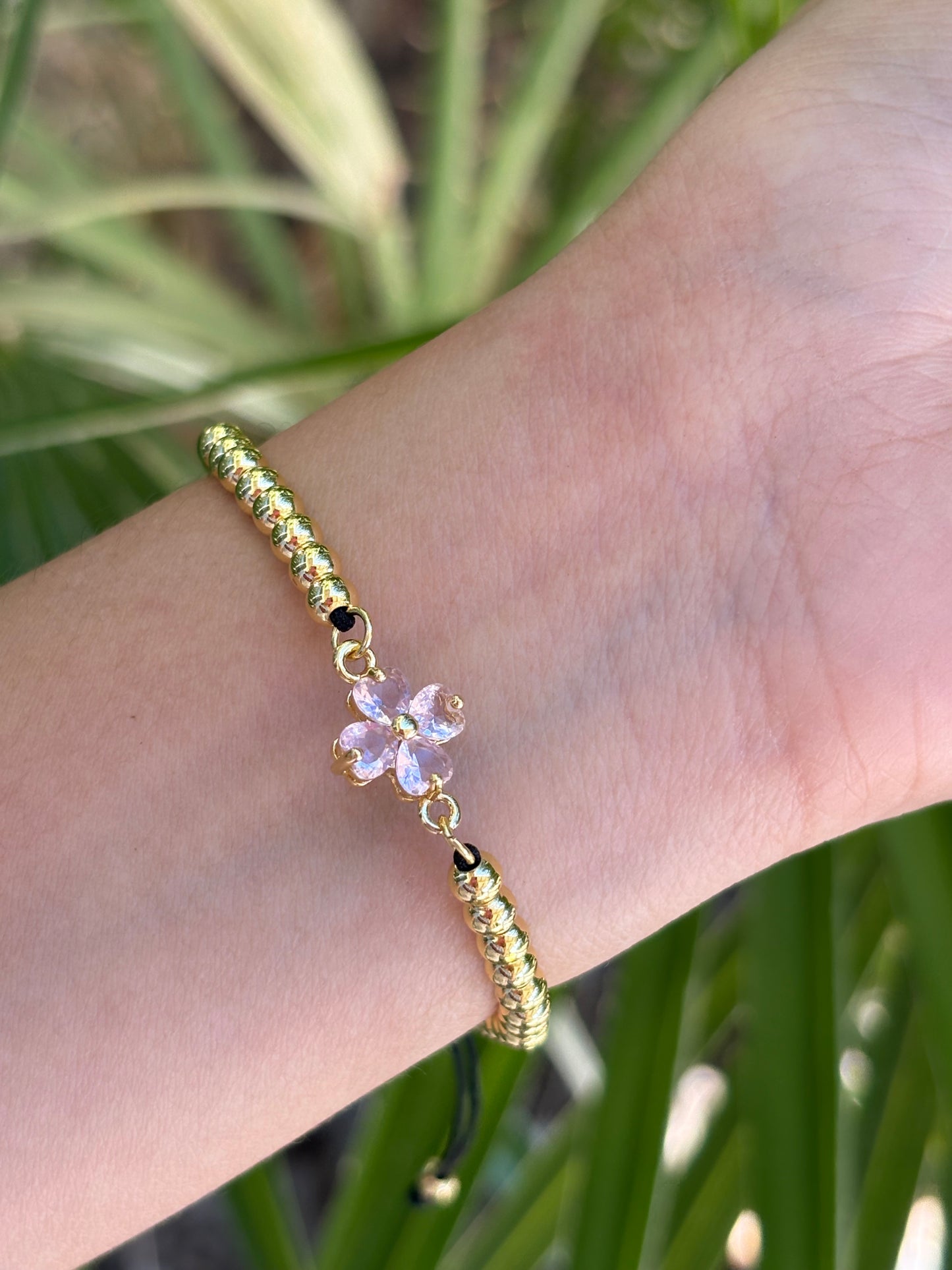 #8-B flower pink hilo bracelet adjustable